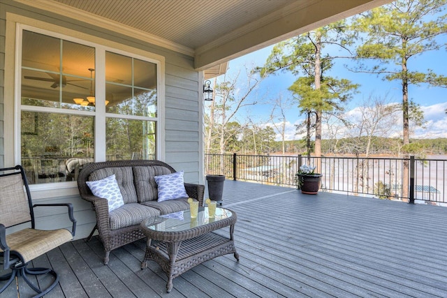 wooden terrace featuring an outdoor living space