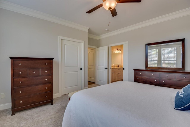 bedroom with light carpet, ornamental molding, connected bathroom, and baseboards