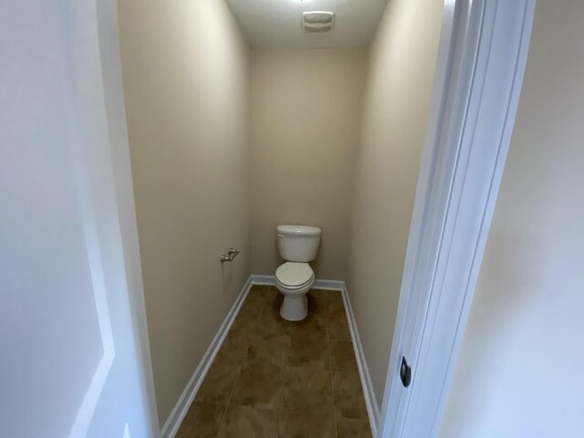 bathroom featuring toilet