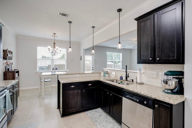 329 Baylor Dr, Graniteville, SC 29829 - kitchen with dishwasher, light stone counters, decorative backsplash, decorative light fixtures, and ornamental molding