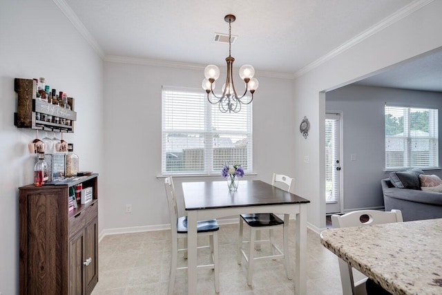 329 Baylor Dr, Graniteville, SC 29829 - dining room with a chandelier, light tile patterned flooring, and ornamental molding