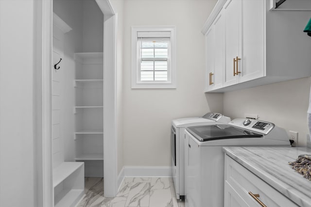 529 River Oaks Ln, Evans, GA 30809 - washroom with light marble finish flooring, cabinet space, washing machine and dryer, and baseboards