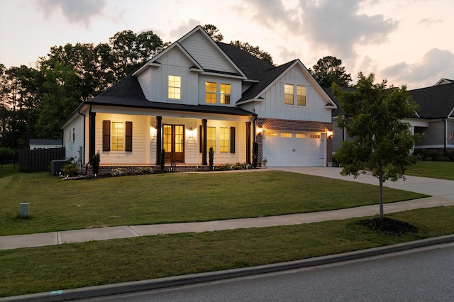 529 River Oaks Ln, Evans, GA 30809 - modern farmhouse style home featuring board and batten siding, an attached garage, covered porch, and concrete driveway