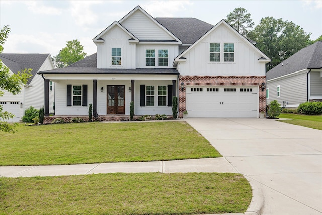529 River Oaks Ln, Evans, GA 30809 - modern farmhouse style home featuring board and batten siding, concrete driveway, an attached garage, covered porch, and a front lawn