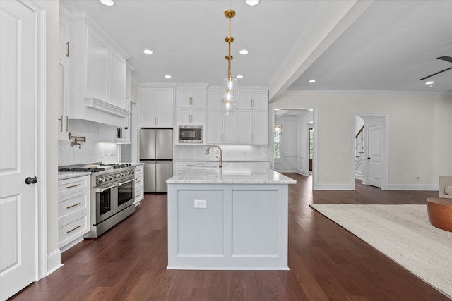 529 River Oaks Ln, Evans, GA 30809 - kitchen with stainless steel appliances, ornamental molding, backsplash, white cabinets, and light stone countertops