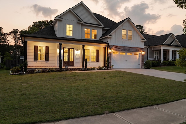 529 River Oaks Ln, Evans, GA 30809 - modern farmhouse featuring board and batten siding, a porch, a garage, driveway, and a front yard