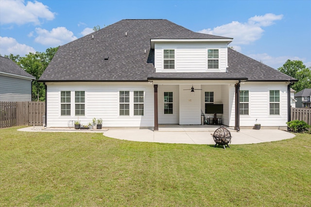 529 River Oaks Ln, Evans, GA 30809 - rear view of property featuring a patio, a ceiling fan, roof with shingles, and an outdoor fire pit