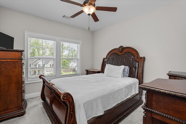 529 River Oaks Ln, Evans, GA 30809 - bedroom featuring light colored carpet, baseboards, and a ceiling fan