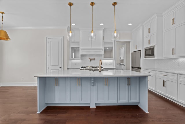 529 River Oaks Ln, Evans, GA 30809 - kitchen with appliances with stainless steel finishes, white cabinetry, tasteful backsplash, recessed lighting, and a kitchen island with sink