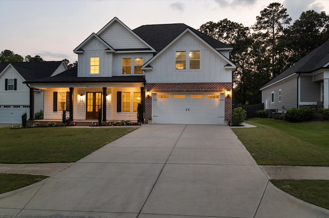 529 River Oaks Ln, Evans, GA 30809 - modern farmhouse featuring board and batten siding, covered porch, brick siding, an attached garage, and concrete driveway
