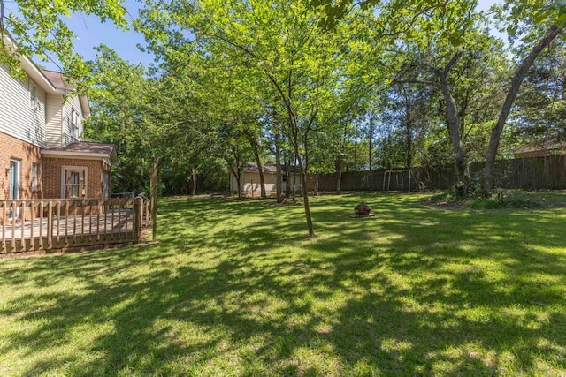 1116 Wrights Mill Rd, Aiken, SC 29801 - view of yard featuring a wooden deck and an outdoor fire pit