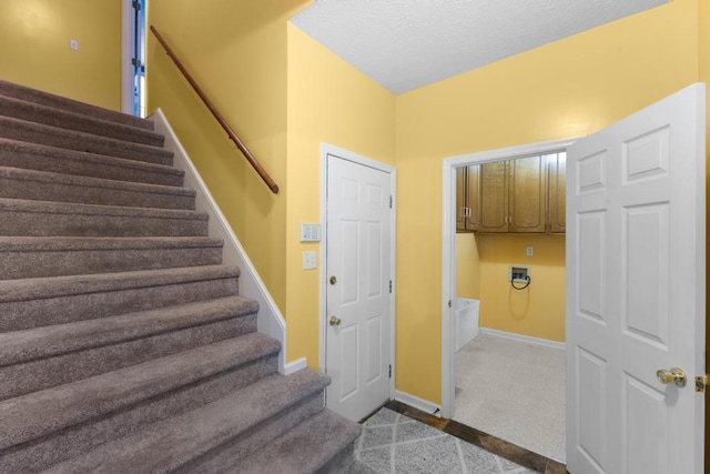 1116 Wrights Mill Rd, Aiken, SC 29801 - stairway with carpet, baseboards, and a textured ceiling