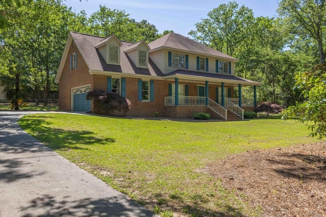 1116 Wrights Mill Rd, Aiken, SC 29801 - view of front facade with a garage, a porch, brick siding, and a front yard