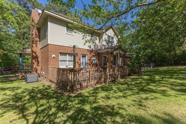 1116 Wrights Mill Rd, Aiken, SC 29801 - rear view of property with a chimney, cooling unit, brick siding, and a wooden deck
