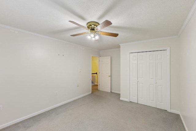 1116 Wrights Mill Rd, Aiken, SC 29801 - unfurnished bedroom with ornamental molding, light colored carpet, baseboards, a closet, and ceiling fan