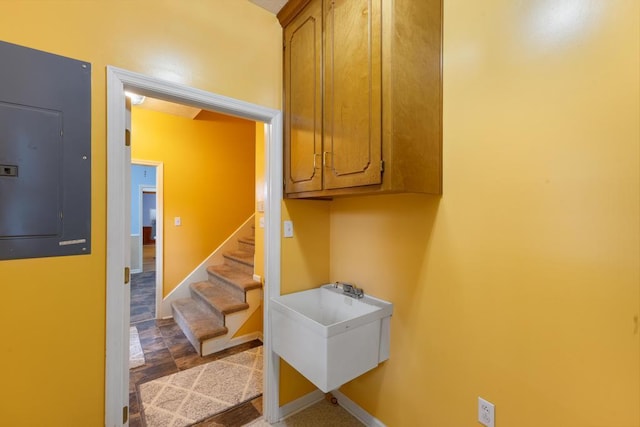 1116 Wrights Mill Rd, Aiken, SC 29801 - stairway featuring electric panel, baseboards, and stone finish floors