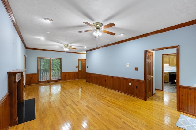 1116 Wrights Mill Rd, Aiken, SC 29801 - spare room with wainscoting, wooden walls, light wood-type flooring, ceiling fan, and ornamental molding