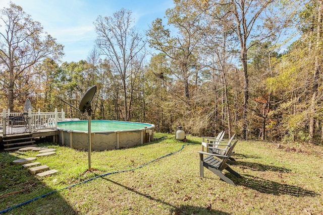 view of yard featuring a swimming pool side deck