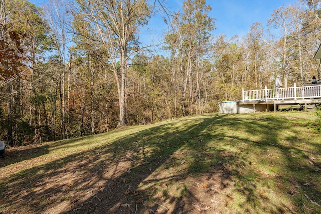 view of yard featuring a wooden deck