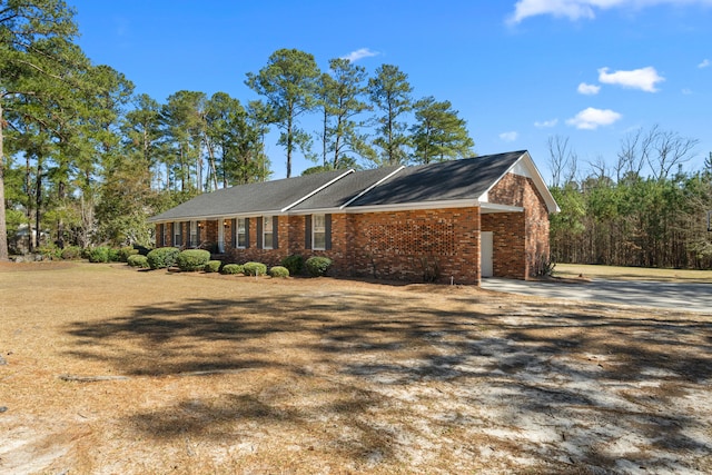 ranch-style home with brick siding