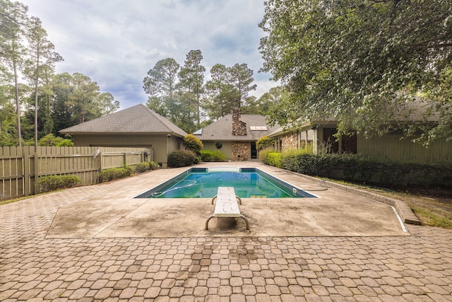 view of swimming pool featuring a patio