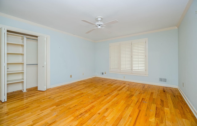 unfurnished bedroom with ceiling fan, light hardwood / wood-style floors, and ornamental molding