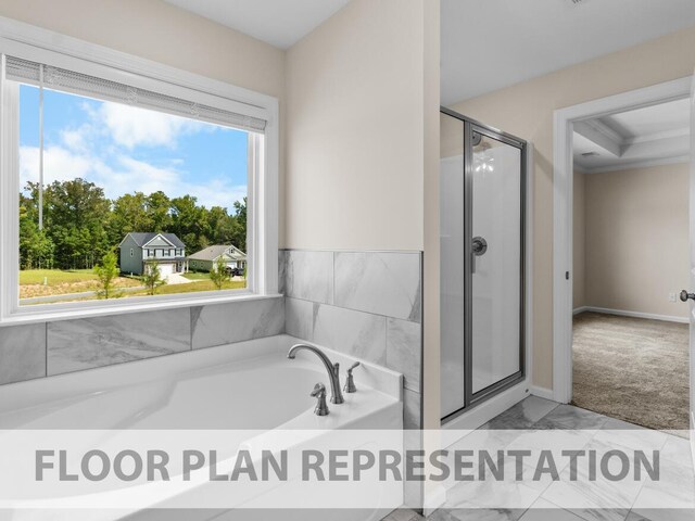 bathroom featuring a stall shower and a garden tub