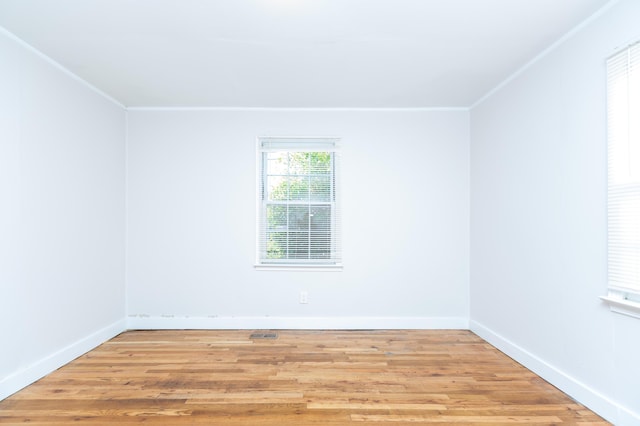 1468 Dewitt St, Augusta, GA 30901 - unfurnished room with ornamental molding and light wood-style floors