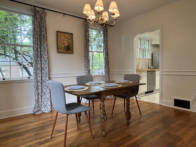 2841 Lombardy Ct, Augusta, GA 30909 - dining space with a chandelier, light wood-style flooring, and healthy amount of natural light