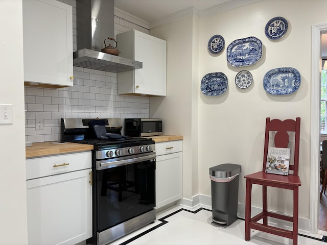 2841 Lombardy Ct, Augusta, GA 30909 - kitchen with stainless steel range with gas stovetop, wall chimney range hood, butcher block counters, ornamental molding, and backsplash