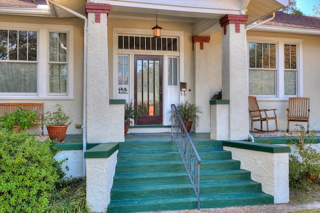 property entrance featuring covered porch