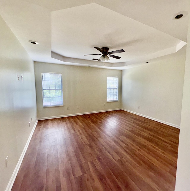 4325 Creekview Dr, Hephzibah, GA 30815 - unfurnished room with a raised ceiling, wood finished floors, baseboards, and a ceiling fan