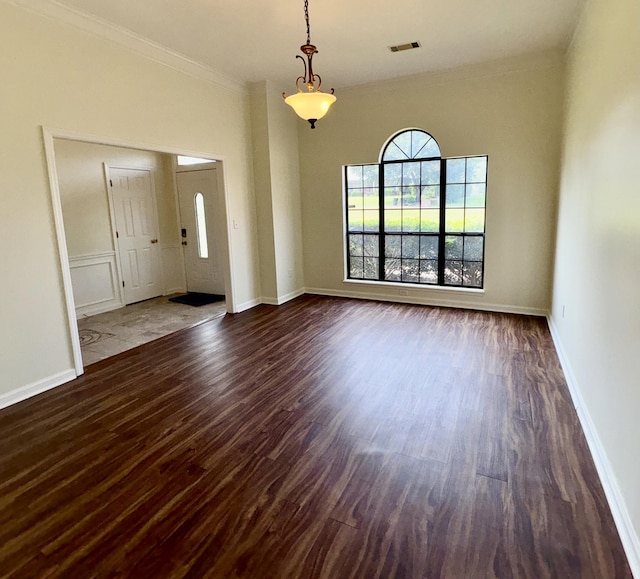 4325 Creekview Dr, Hephzibah, GA 30815 - foyer with dark wood-type flooring, ornamental molding, and baseboards