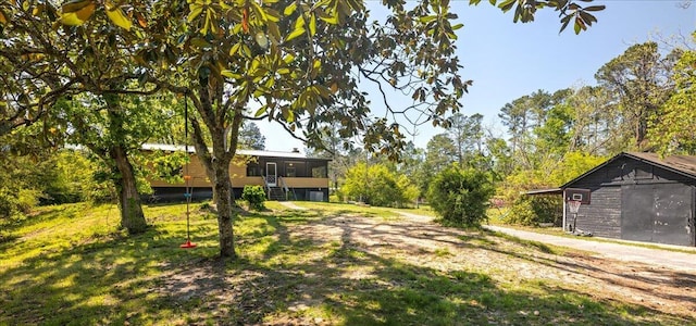 view of yard with a sunroom