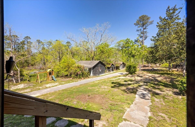 view of yard with a playground