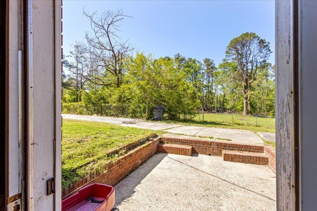 view of patio / terrace with fence