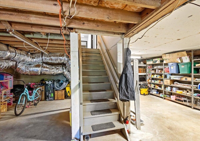 unfinished basement with stairs
