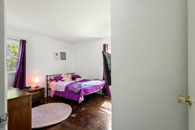 bedroom featuring hardwood / wood-style floors