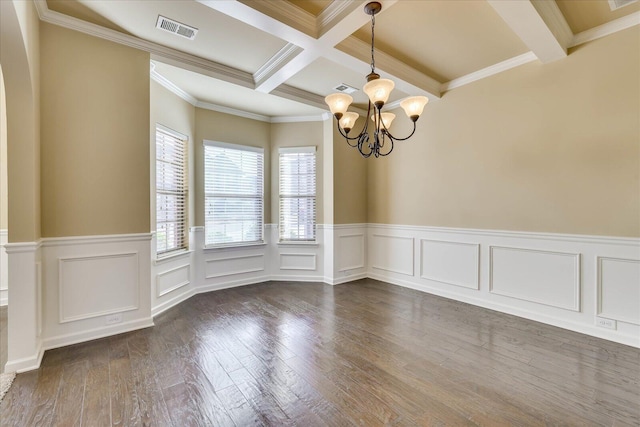 unfurnished room featuring beam ceiling, a chandelier, coffered ceiling, and ornamental molding