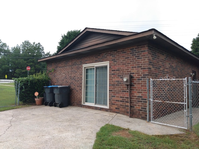 view of property exterior featuring a patio