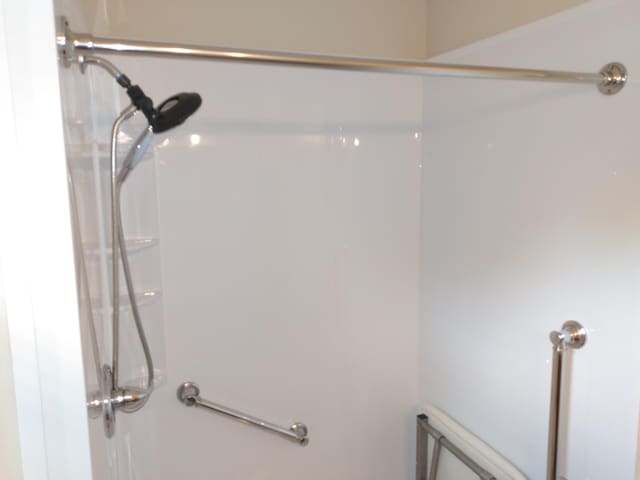 bathroom with walk in shower