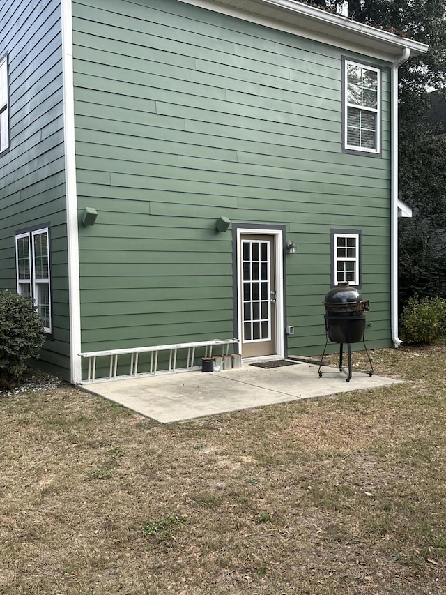 back of house featuring a patio