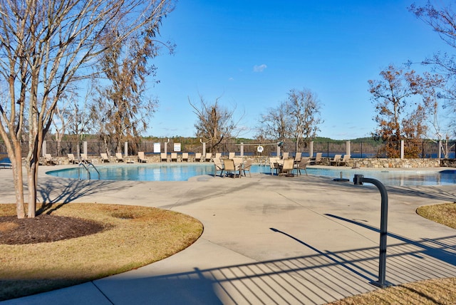 view of pool featuring a patio