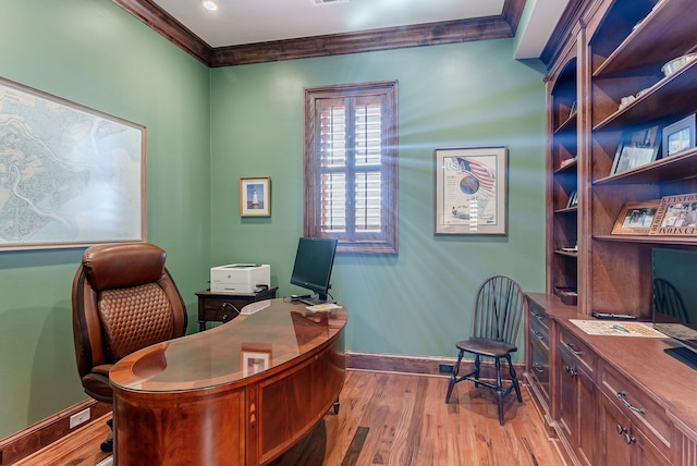 office space featuring light hardwood / wood-style flooring and ornamental molding