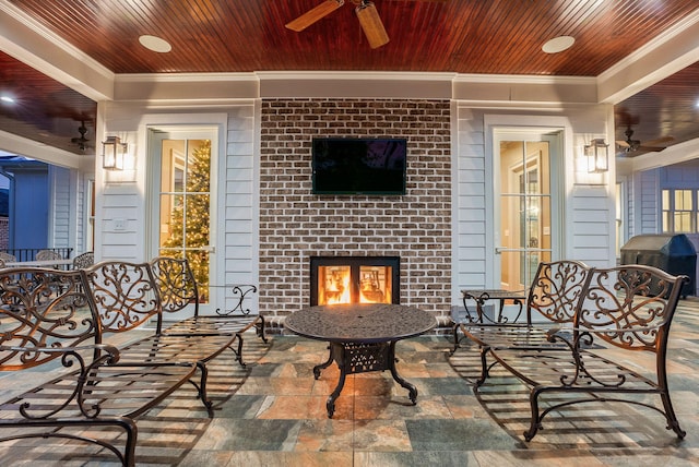 view of patio / terrace with area for grilling and ceiling fan