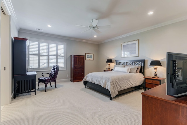 carpeted bedroom featuring ceiling fan and ornamental molding