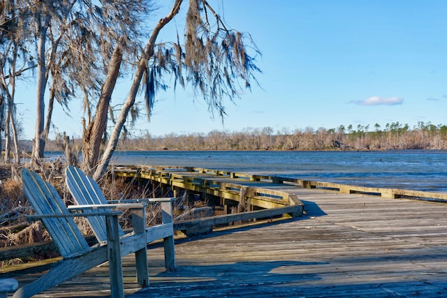 view of dock with a water view