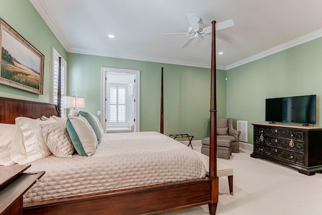 bedroom featuring ceiling fan, carpet, and ornamental molding