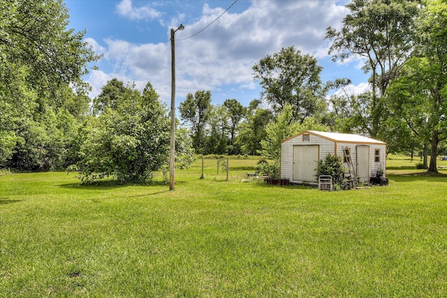 1219 Susan Ct, Waynesboro, GA 30830 - view of yard with a storage shed and an outdoor structure