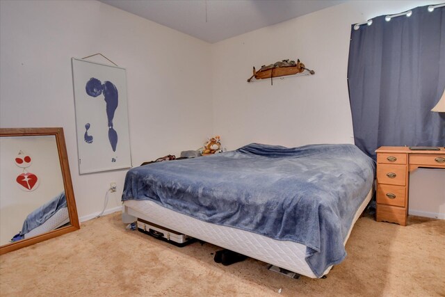 1219 Susan Ct, Waynesboro, GA 30830 - bedroom with baseboards and light carpet